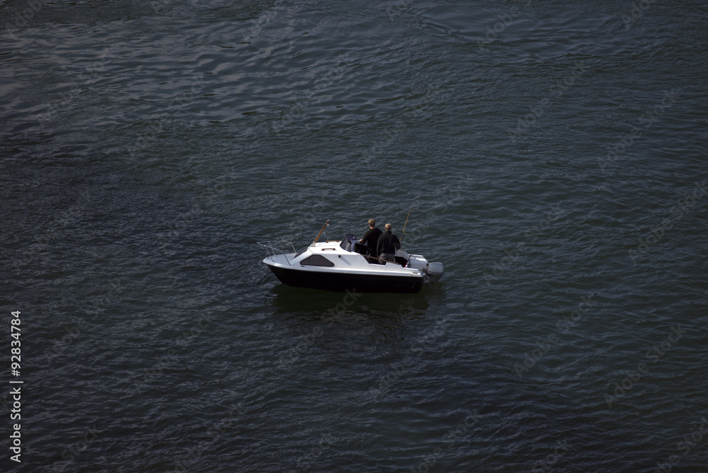 Fototapeta premium Two men in a boat