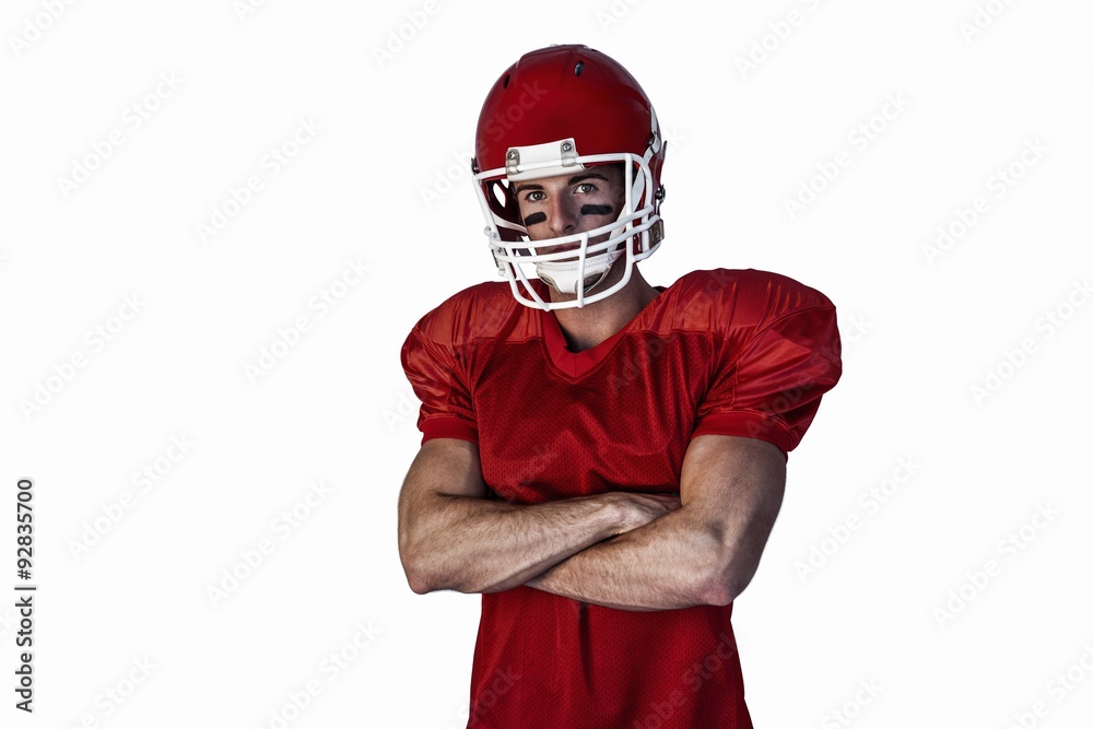 Portrait of rugby player wearing helmet with arms crossed Portrait of rugby player wearing helmet with arms crossed