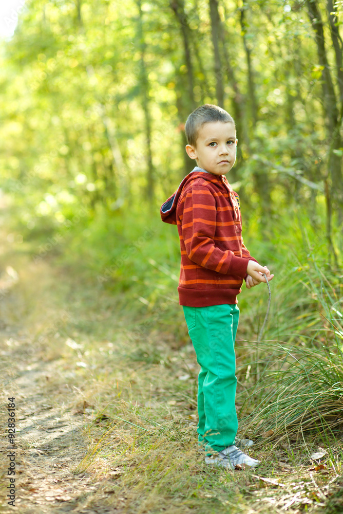 Portrait of a little boy in park Portrait of a little boy in park