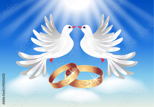Card with wedding rings and two doves