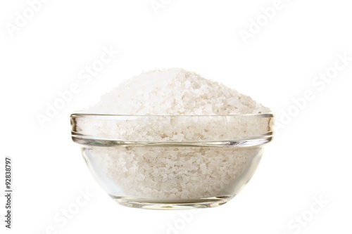 sea salt in a bowl on white isolated background