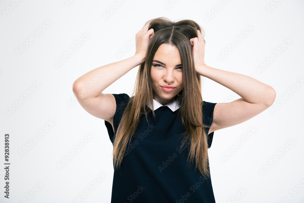 Portrait of a cute woman touching her hair Portrait of a cute woman touching her hair