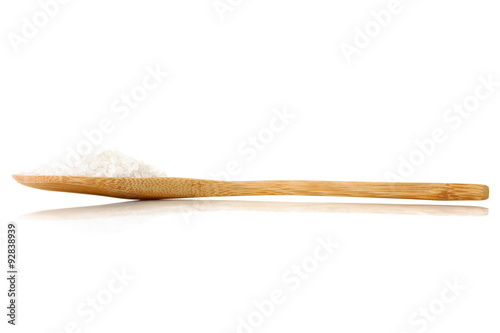 sea salt on wooden spoon isolated on white background