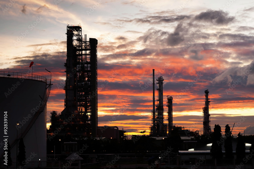 Silhouette of petrochemical industrial plant in sunrise