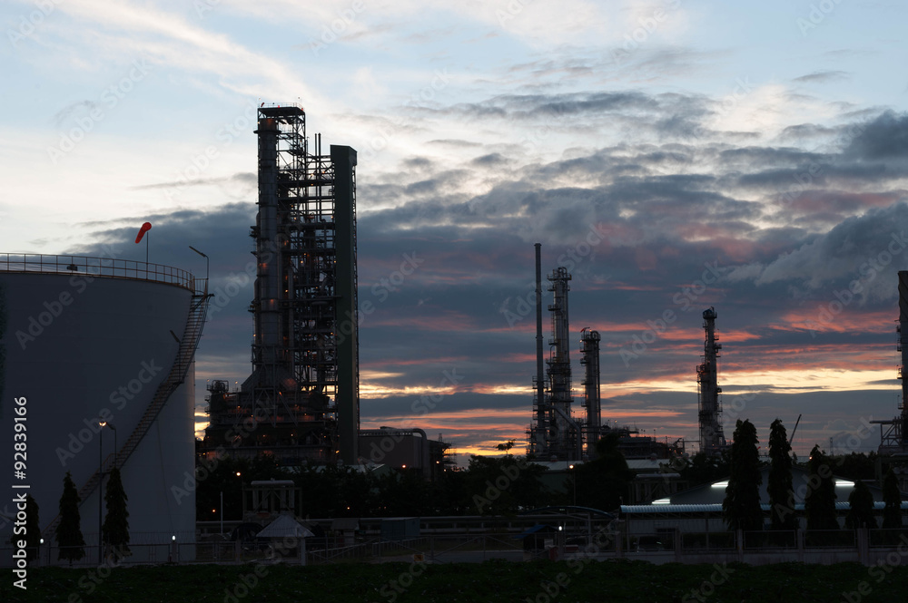 Silhouette of petrochemical industrial plant in sunrise