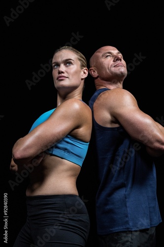 Low angle view of muscular man and woman