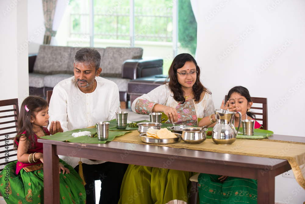 indian family having a meal indian family having a meal