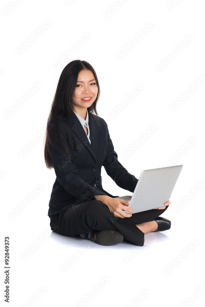 asian chinese female sitting and using laptop asian chinese female sitting and using laptop