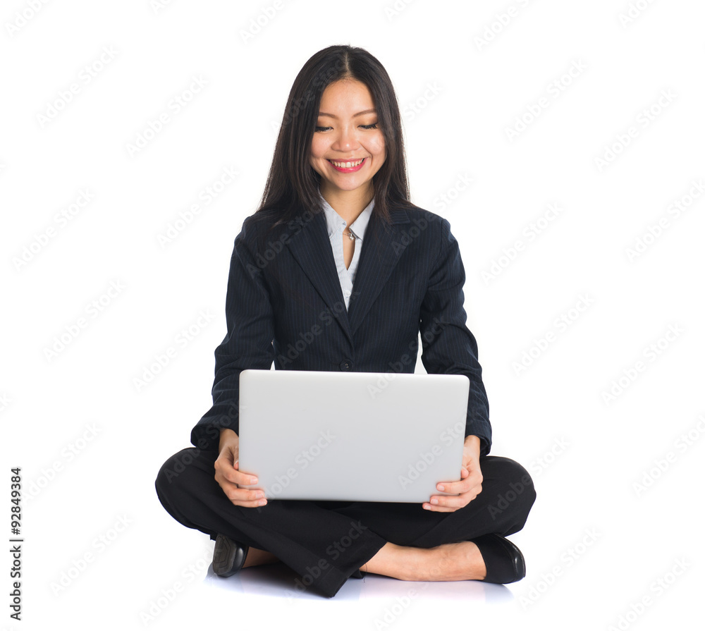 asian chinese female sitting and using laptop asian chinese female sitting and using laptop
