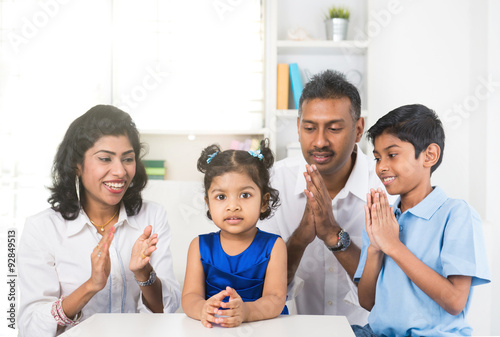 portrait photo of happy indian family