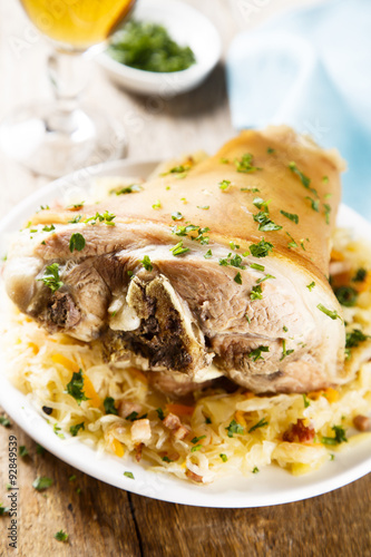 Photography Pork leg, cooked with cabbage and ham