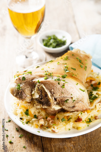 Photography Pork leg, cooked with cabbage and ham