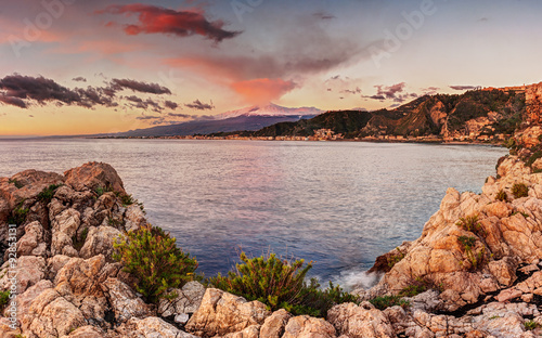 Mount Etna at sunrise seen from Taormina, Sicily...