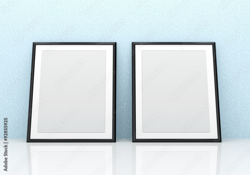 Two blank black picture frames Two blank black picture frames