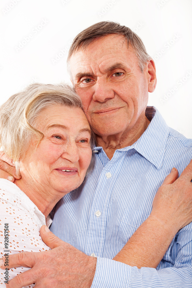 portrait of smiling elderly couple