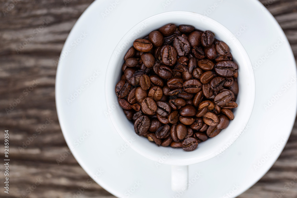 Coffee beans in cup Coffee beans in cup