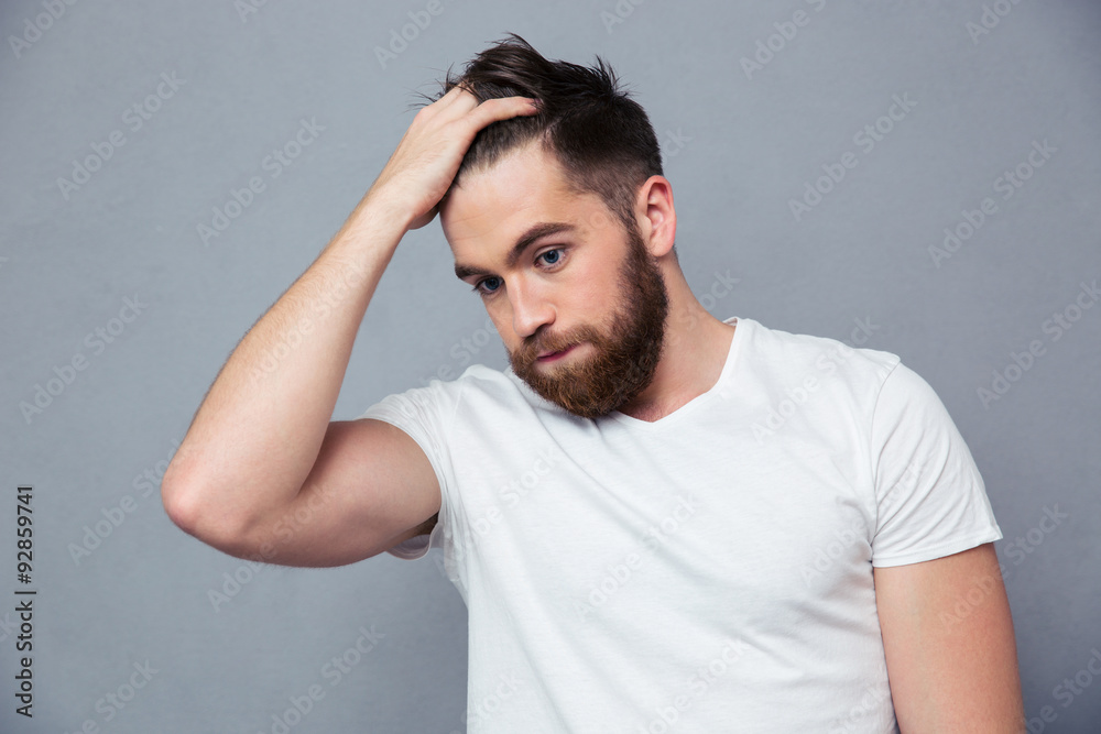 Portrait of a pensive casual man Portrait of a pensive casual man