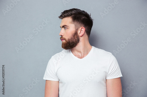 Portrait of a casual young man looking away
