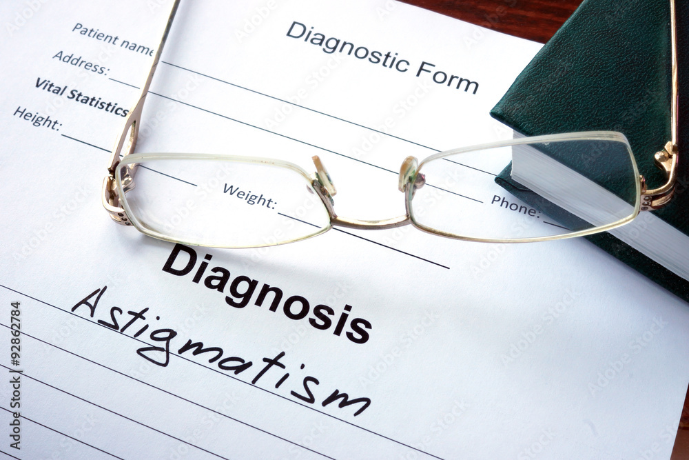 Diagnosis list with Astigmatism and glasses. Eye disorder concept. Diagnosis list with Astigmatism and glasses. Eye disorder concept.