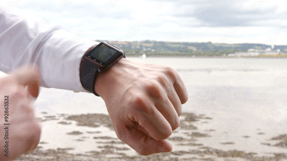 Close up of a man using his smart watch Close up of a man using his smart watch