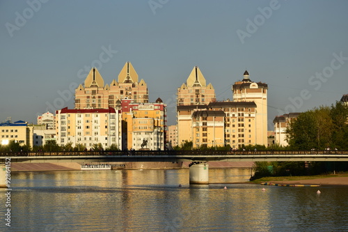 Modern buildings in Astana, Kazakhstan, reflected in the Ishim river