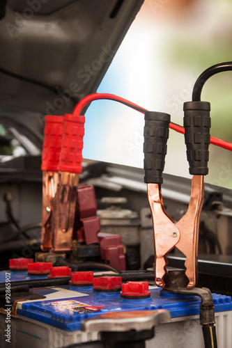 Charging battery car with electricity trough jumper cables