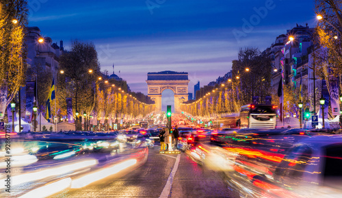 Avenue des Champs-Elysees with Christmas lighting leading up to the Arc de Triomphe in Paris, France © FelixCatana