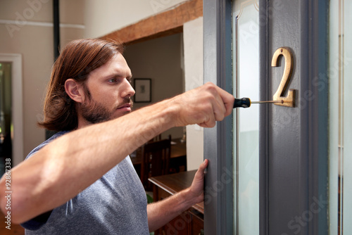 male doing household duties