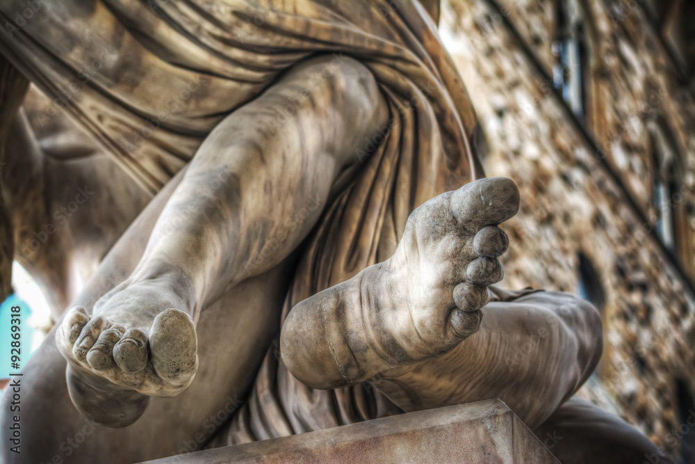 detail of feet of Ratto di Polissena statue detail of feet of Ratto di Polissena statue