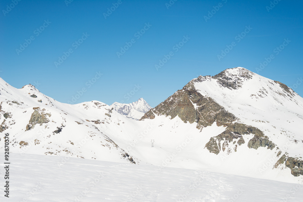Majestic mountain peaks in winter in the Alps Majestic mountain peaks in winter in the Alps
