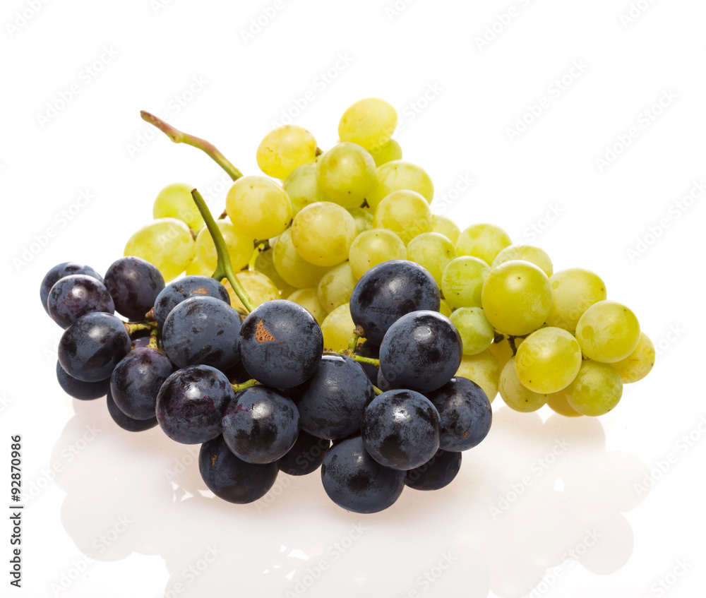Fresh grape cluster on white with water drops Fresh grape cluster on white with water drops