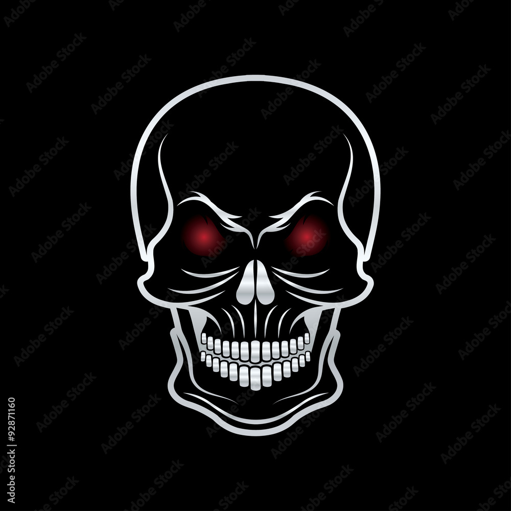 silver skull with red eyes on black background