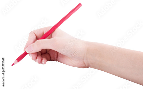 Red pencil in women hand isolated on white background, holds, writes, draws.