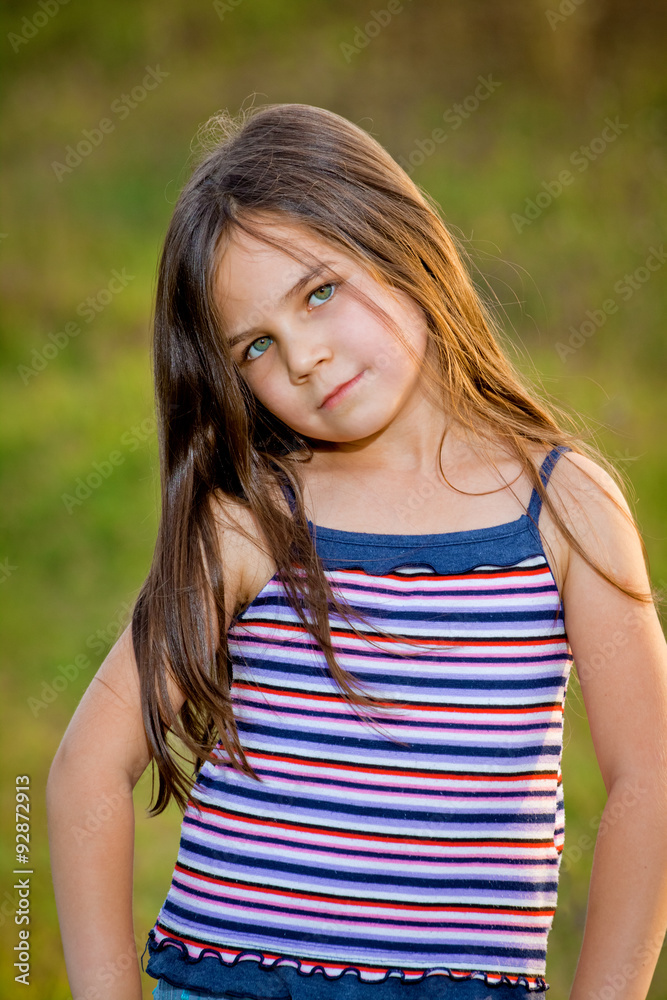Little Girl Posing in the Camera Little Girl Posing in the Camera