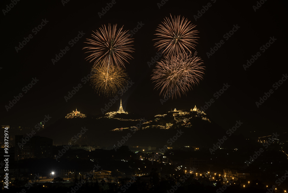 Celebrities firework with ancient pagodas on mountain in night sky Celebrities firework with ancient pagodas on mountain in night sky