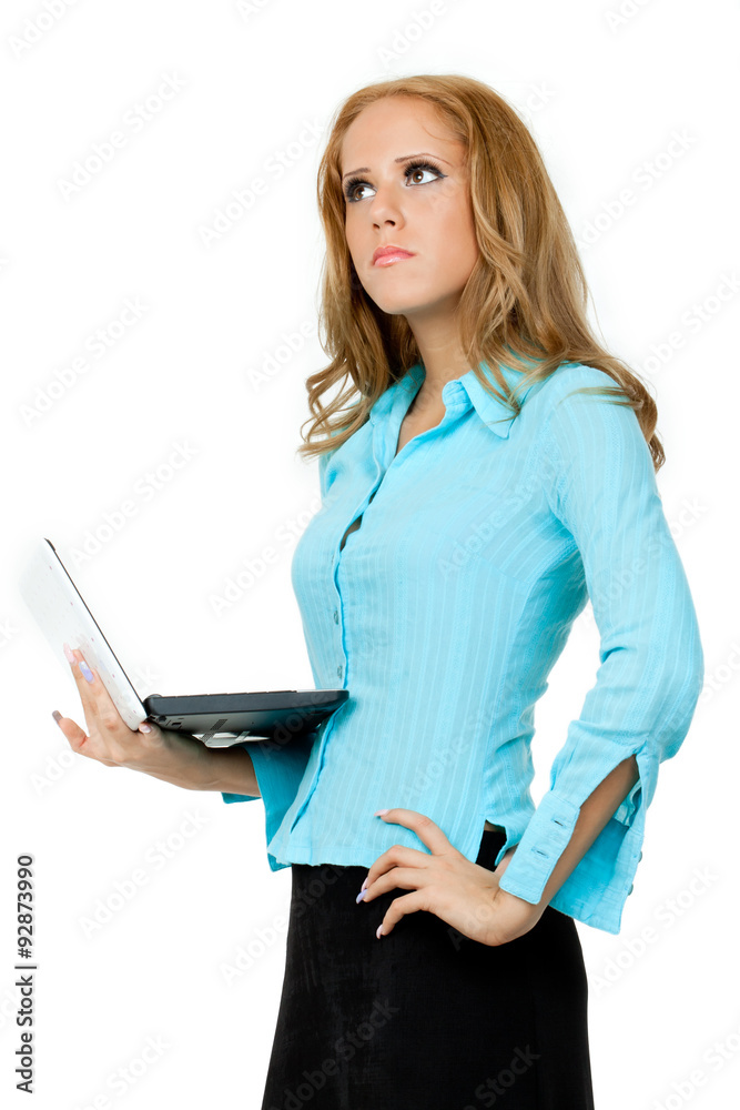 Portrait of a beautiful young woman in a business suit with a la Portrait of a beautiful young woman in a business suit with a la