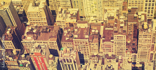 Vintage filtered panoramic view of Manhattan roofs. #92875906
