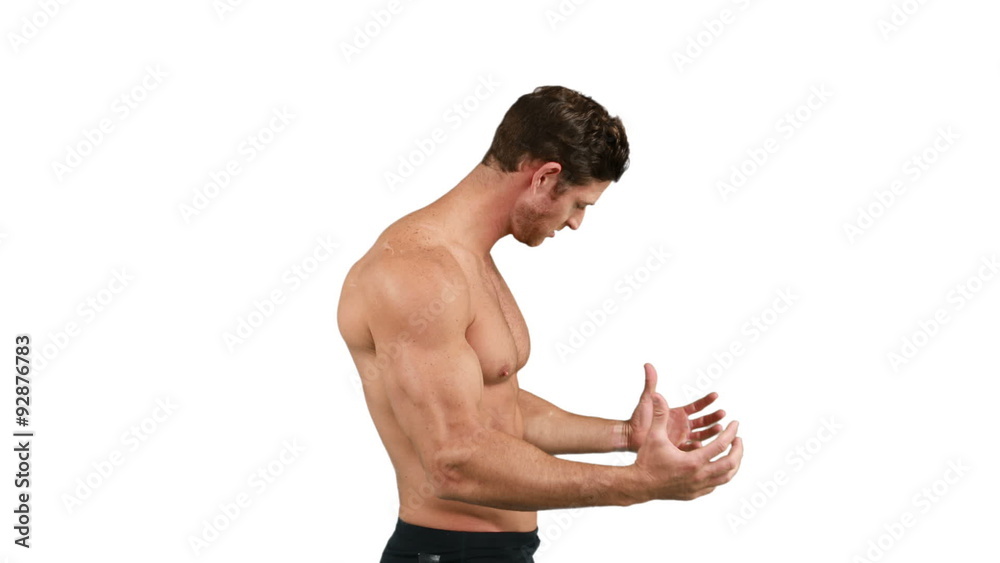Muscular man flexing his muscles Muscular man flexing his muscles