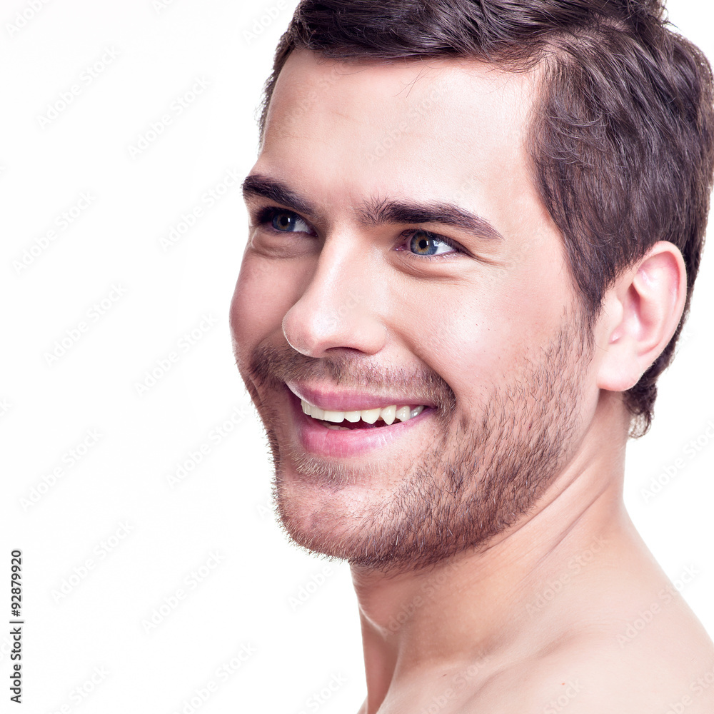 Obraz premium Portrait of handsome smiling young man.