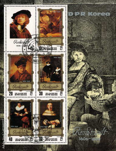 DPR KOREA - CIRCA 1983: mail stamp printed in DPR Korea featuring Rembrandt van Rijn. A reproduction of his self portrait and other famous works, on the background of engraving "weigher gold"