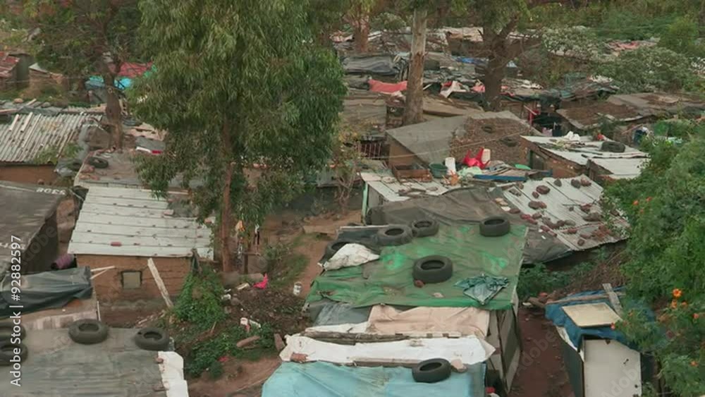 Pan of squatter housing settlement. Pan of squatter housing settlement.