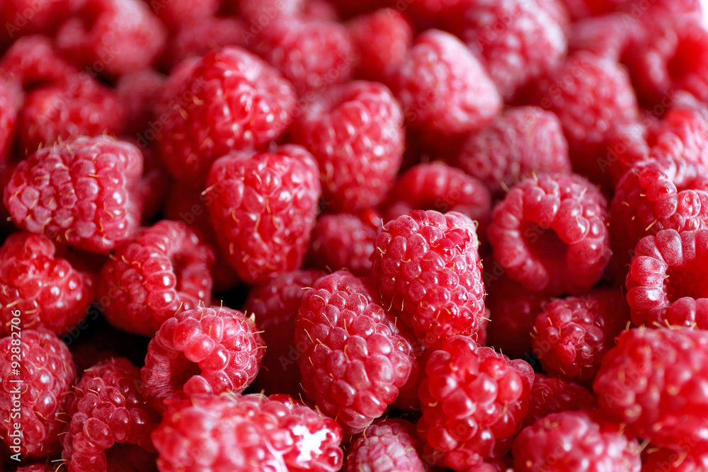 Heap of sweet red raspberries close up Heap of sweet red raspberries close up