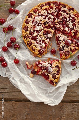 Fototapeta Naklejka Na Ścianę i Meble -  Tasty homemade pie with cherries on table close up