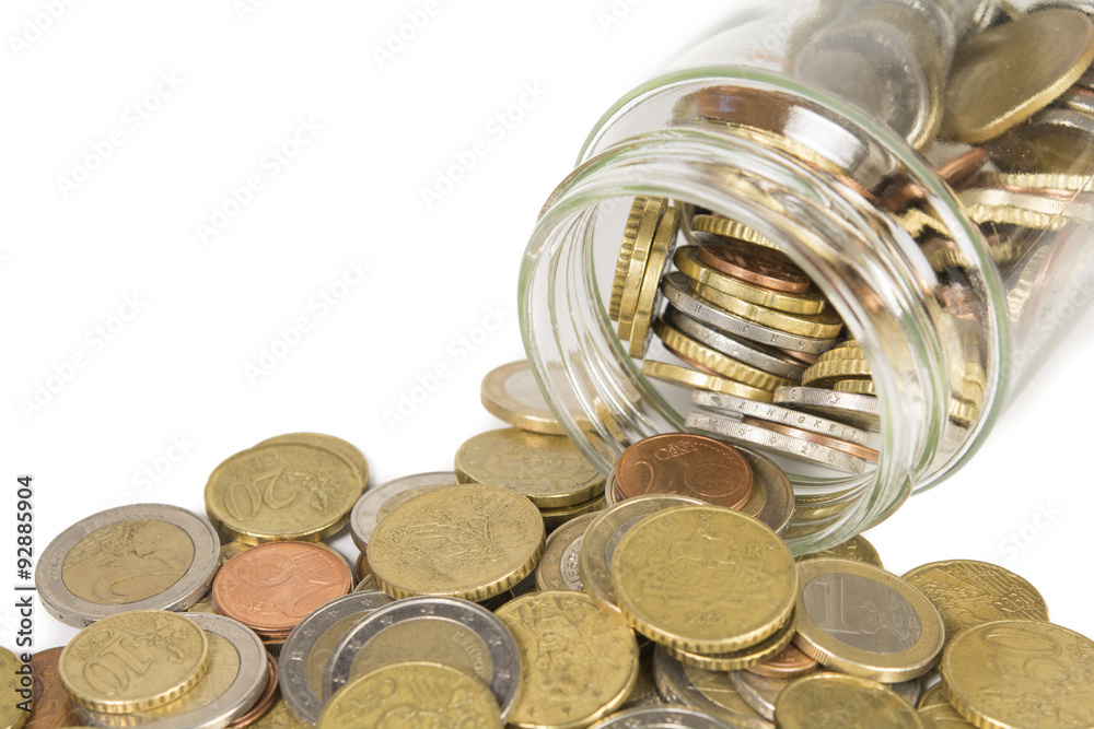 euro coins, spilling out of a jar. Isolated on white euro coins, spilling out of a jar. Isolated on white