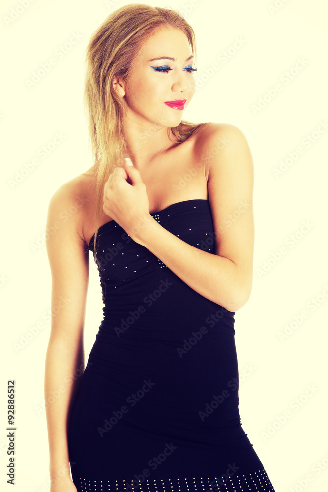 Fototapeta premium Young woman wearing party dress.