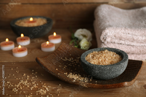 Beautiful spa composition with candles on wooden background