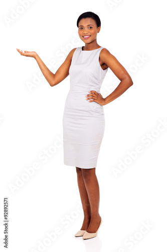 african businesswoman presenting empty space