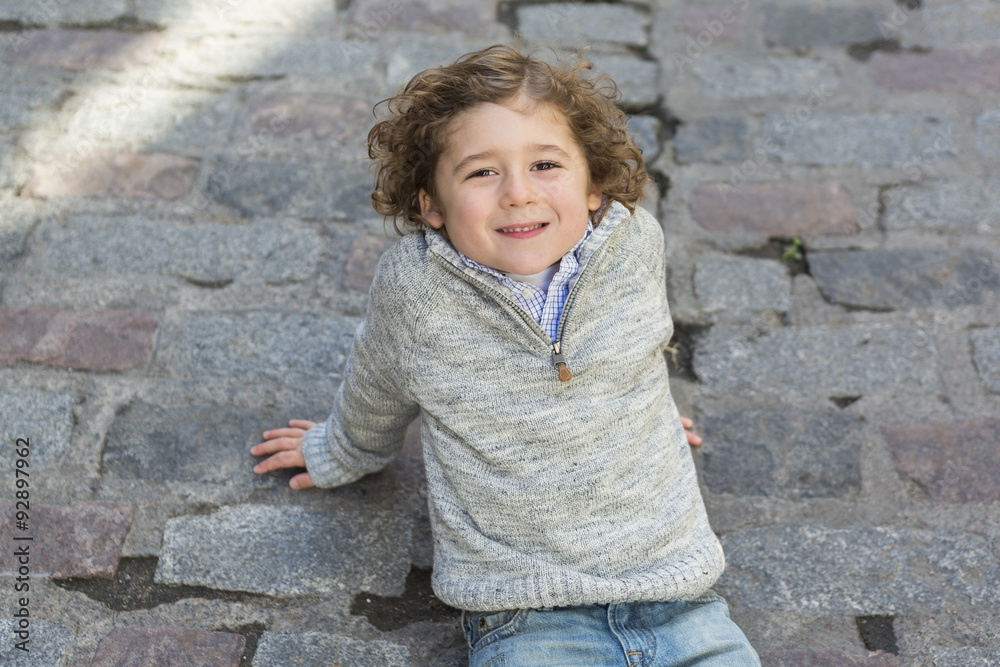 portrait of a boy on a urban background portrait of a boy on a urban background