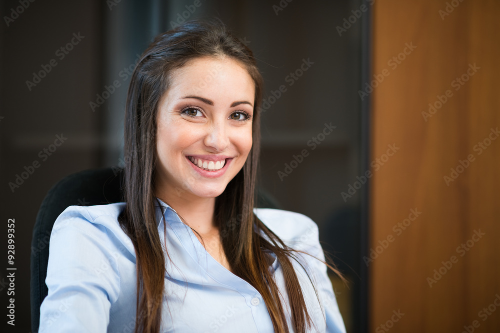Portrait of a woman in her office Portrait of a woman in her office