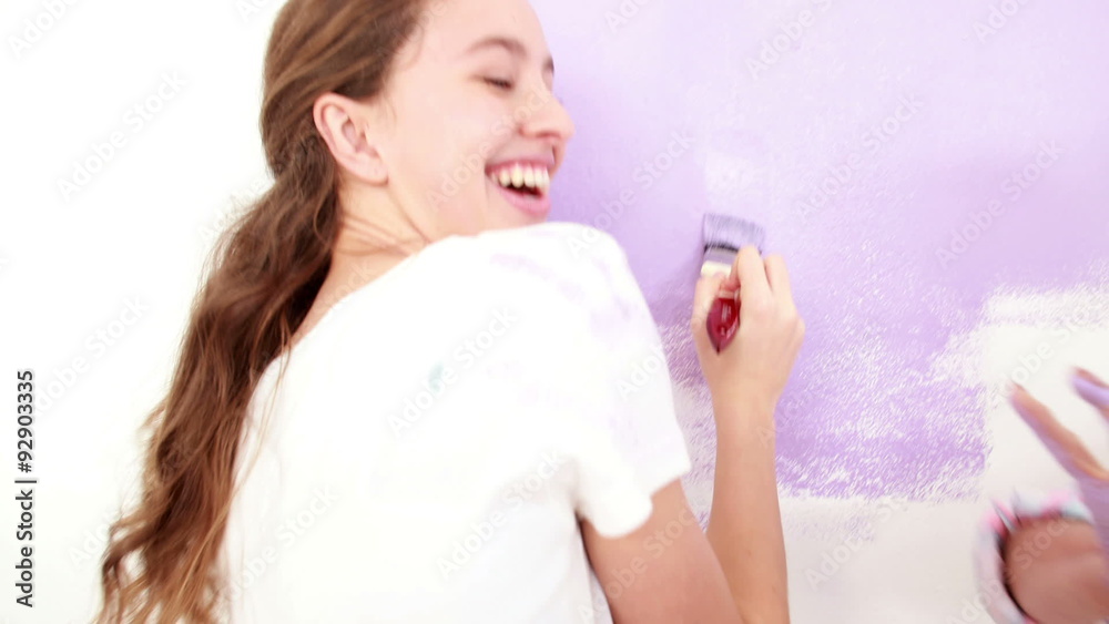 Mother and daughter redecorating together Mother and daughter redecorating together